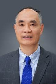 A person in a suit and tieAI-generated content may be incorrect.